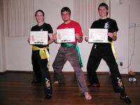 Deborah, Bernard and Amy can smile now that they have their new sashes and certificates!