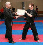 Master Hardy congratulates his new Black Belt, Sifu Stephen Wells.