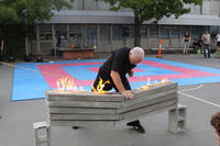 Master Hardy breaks 5 concrete sleepers on fire at the North AInslioe demonstration