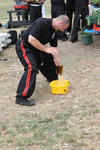 Master Bellchambers shattering the bottom from a bottle