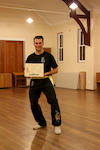 Jono, with certificate and sash